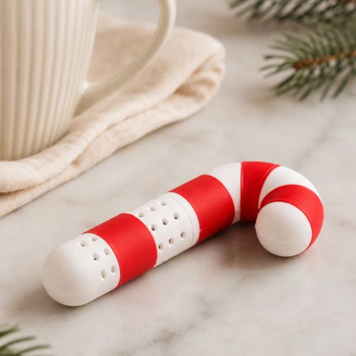 Świąteczny zaparzacz do herbaty w kształcie laski cukrowej.