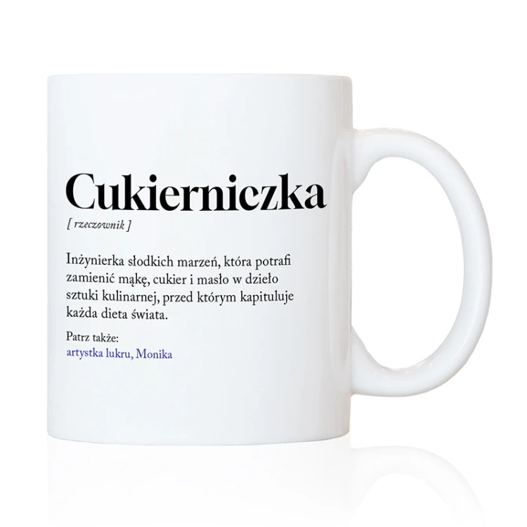 Biały kubek dla cukiernika zdobi humorystyczna definicja zawodu.