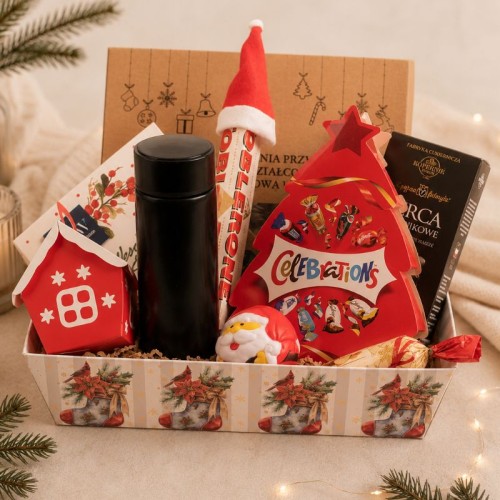 Paczka świąteczna z termosem, Toblerone, Celebrations, krówkami i świątecznymi słodyczami.