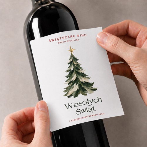 Samoprzylepna etykieta świąteczna na wino z zieloną choinką, gwiazdą i życzeniami Wesołych Świąt.