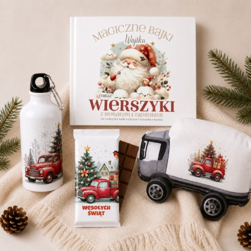 Elementy świątecznego zestawu dla dziecka z personalizowaną książką i poduszką ciężarówką.