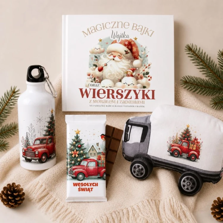 Elementy świątecznego zestawu dla dziecka z personalizowaną książką i poduszką ciężarówką.