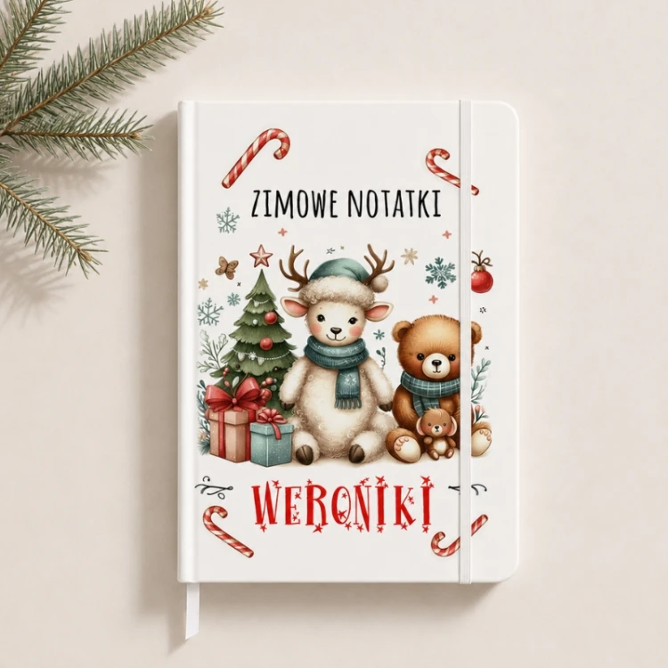 Personalizowany notatnik z reniferkiem i misiem zachęca dziecko do rysowania i pisania.
